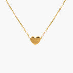 JUNE ELLE gold custom heart necklace engraved with C&M front view on white background