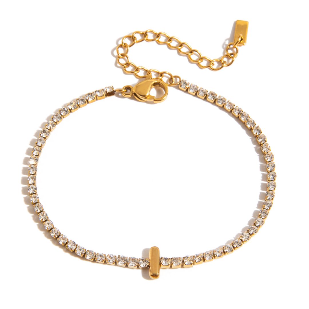 JUNE ELLE gold initial tennis bracelet with letter I arranged in a perfect circle on white background front view