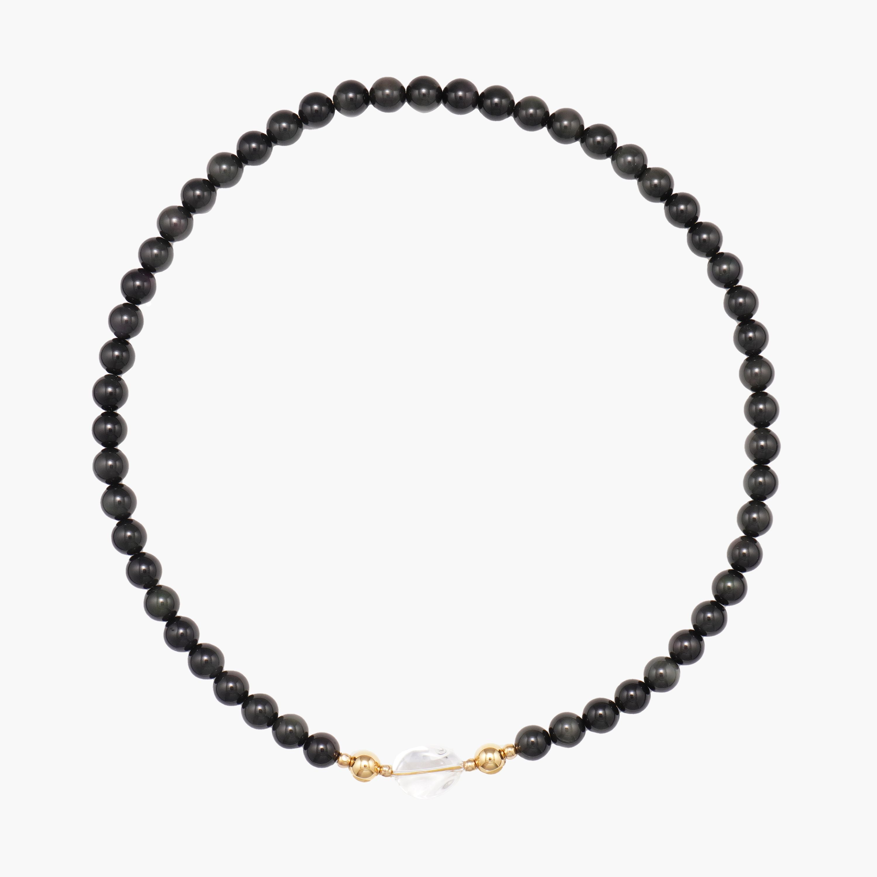 JUNE ELLE MagMix Black Obsidian Bead Necklace and a Clear Quartz Jelly Bean Centerpiece connected via a central gold magnetic clasp on a pure white background, showcasing modular combinations.