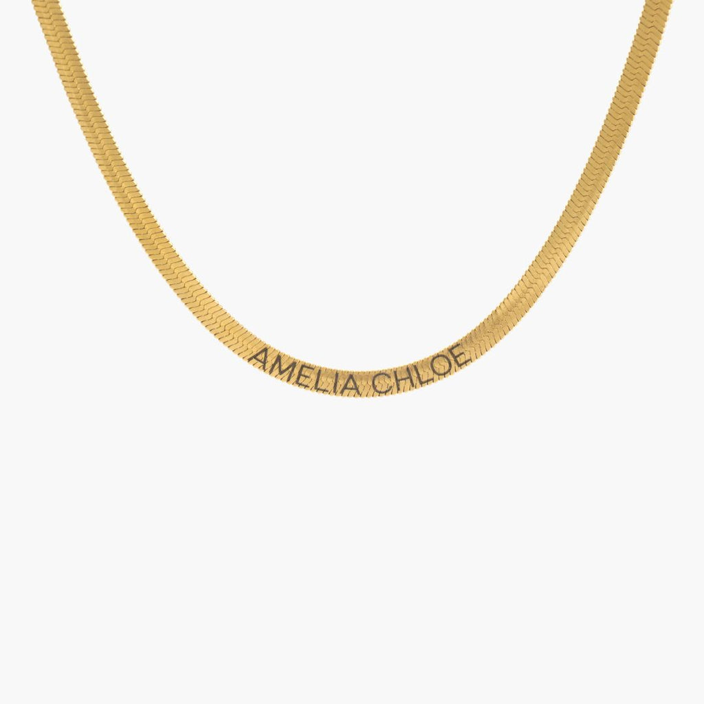 JUNE ELLE gold herringbone custom name necklace engraved with AMELIA CHLOE front view on white background