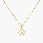 JUNE ELLE gold mother-of-pearl clover initial charm letter O on sphere chain necklace front view on white background