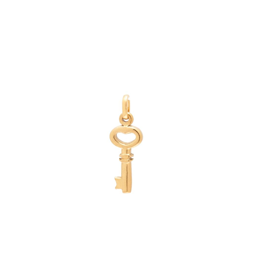 JUNE ELLE 18K gold plated 316L stainless steel heart key pendant on a white background, standalone charm only.