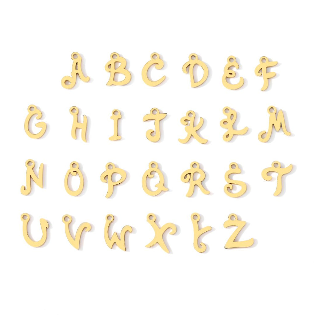 JUNE ELLE gold dearest initial charm letters A to Z arranged on white background