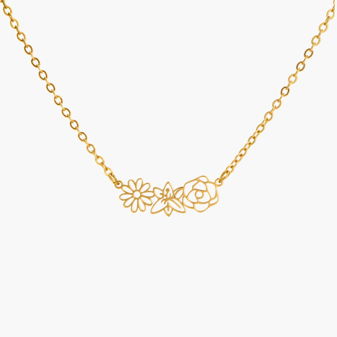 JUNE ELLE gold multiple birth flowers necklace with April Daisy, May Lily and June Rose integrated into chain front view on white background, customizable 1 to 5 flowers