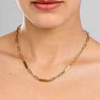 JUNE ELLE gold engraved tag name necklace on paperclip chain with Isabella, Oliver and 06.21.2024 worn on model close front view