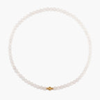 JUNE ELLE MagMix White Chalcedony Bead Necklace with a central gold magnetic clasp on a pure white background, allowing for modular combinations with other MagMix pieces.