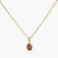 JUNE ELLE 14K gold plated stainless steel January birthstone color cubic zirconia pendant necklace, clear front view