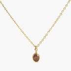 JUNE ELLE 14K gold plated stainless steel January birthstone color cubic zirconia pendant necklace, clear front view