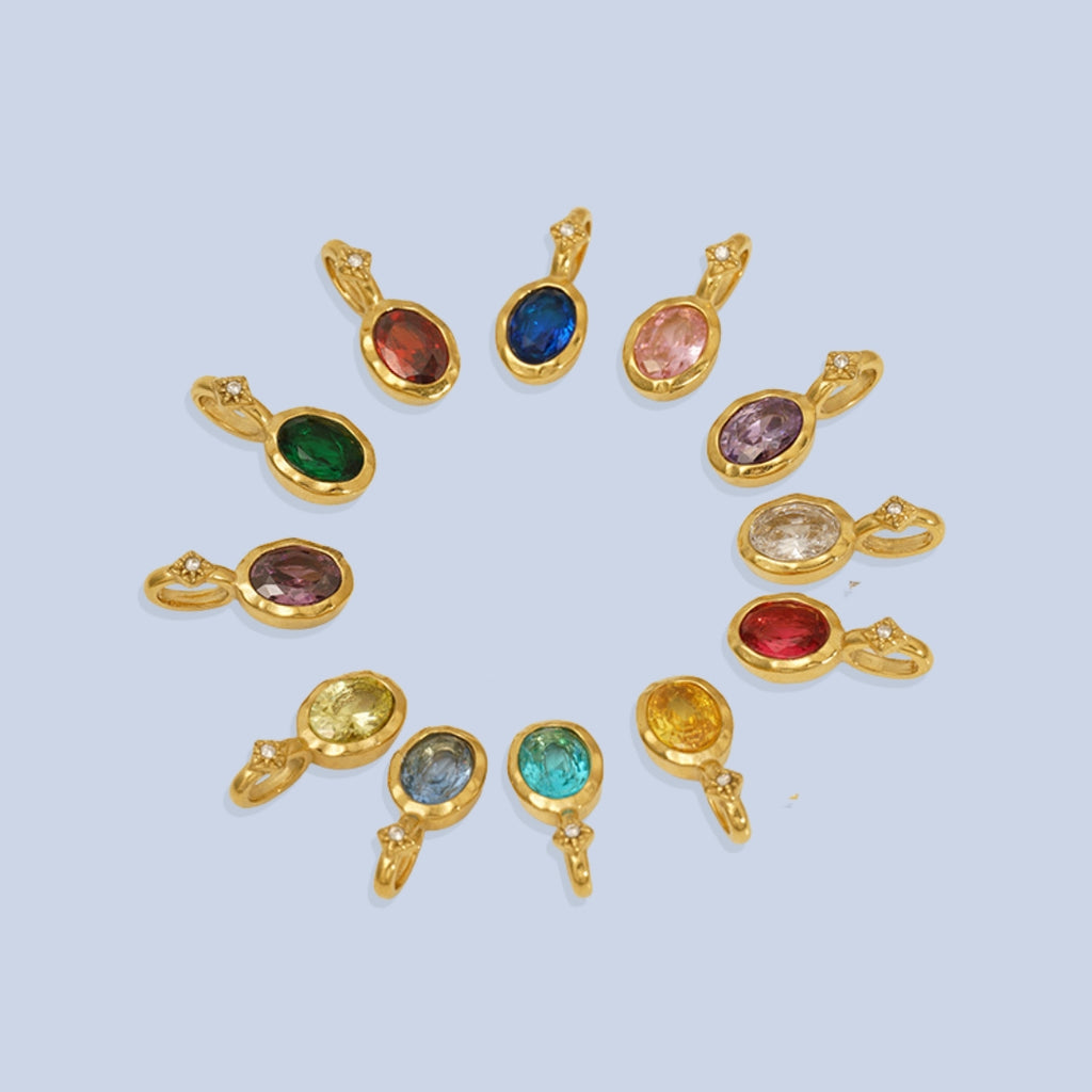 JUNE ELLE 14K gold plated stainless steel cubic zirconia birthstone pendants, 12 months colors arranged in circle, front view