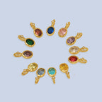 JUNE ELLE 14K gold plated stainless steel cubic zirconia birthstone pendants, 12 months colors arranged in circle, front view