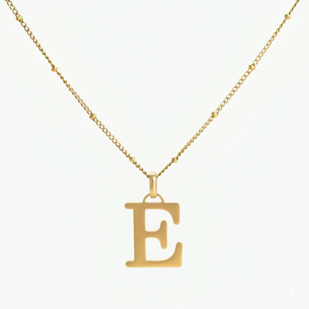 JUNE ELLE 18K gold plated stainless steel personalized E initial pendant necklace, custom letter jewelry shown in clear front view