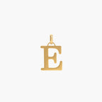JUNE ELLE 18K gold plated stainless steel E initial pendant necklace, clear front view
