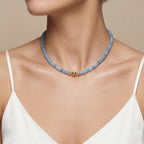 Model wearing the JUNE ELLE Blue Chalcedony Bead Chain Necklace with a front-facing gold magnetic clasp.