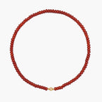 JUNE ELLE MagMix Carnelian Bead Necklace with a central gold magnetic clasp on a pure white background, allowing for modular combinations with other MagMix pieces.