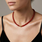 Model wearing the JUNE ELLE MagMix Red Carnelian Bead Chain Necklace with a front-facing gold magnetic clasp.