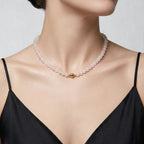 Model wearing the JUNE ELLE White Chalcedony Bead Chain Necklace with a front-facing gold magnetic clasp.